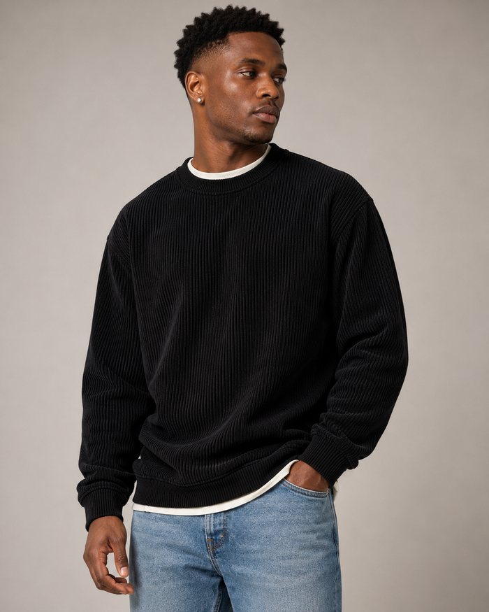 Black Cascade Corduroy Sweatshirt styled on a male model, front view