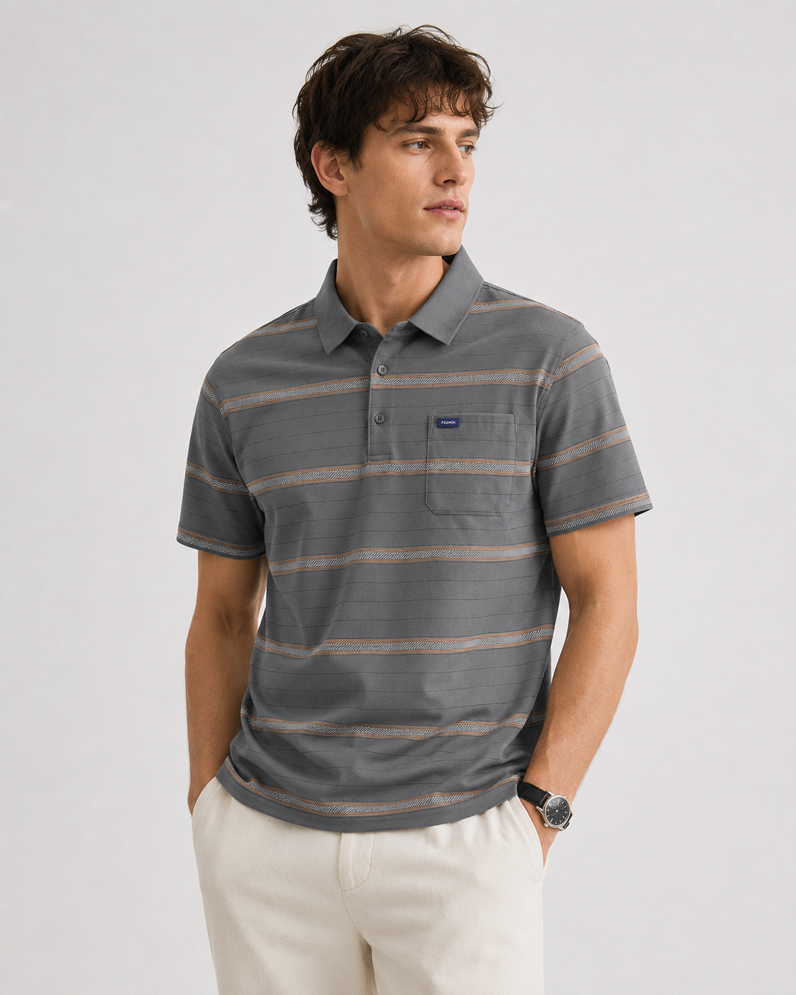 Dark Gray Corsica Striped Polo Tee styled on a male model, front view