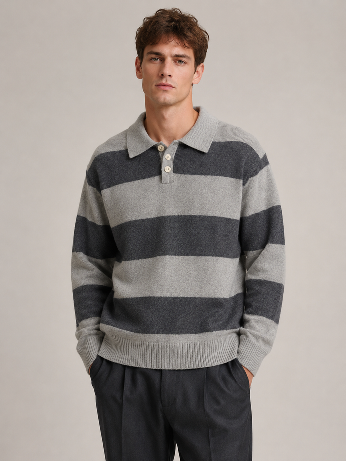Male model wearing a gray contrast-collar striped knit polo sweater, front view in a professional studio