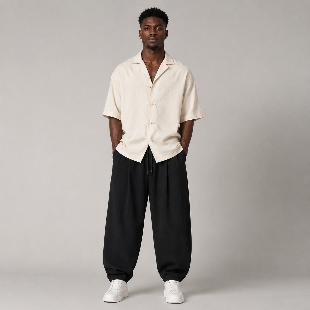 Black Harbor Tapered Trousers styled on a male model, front view