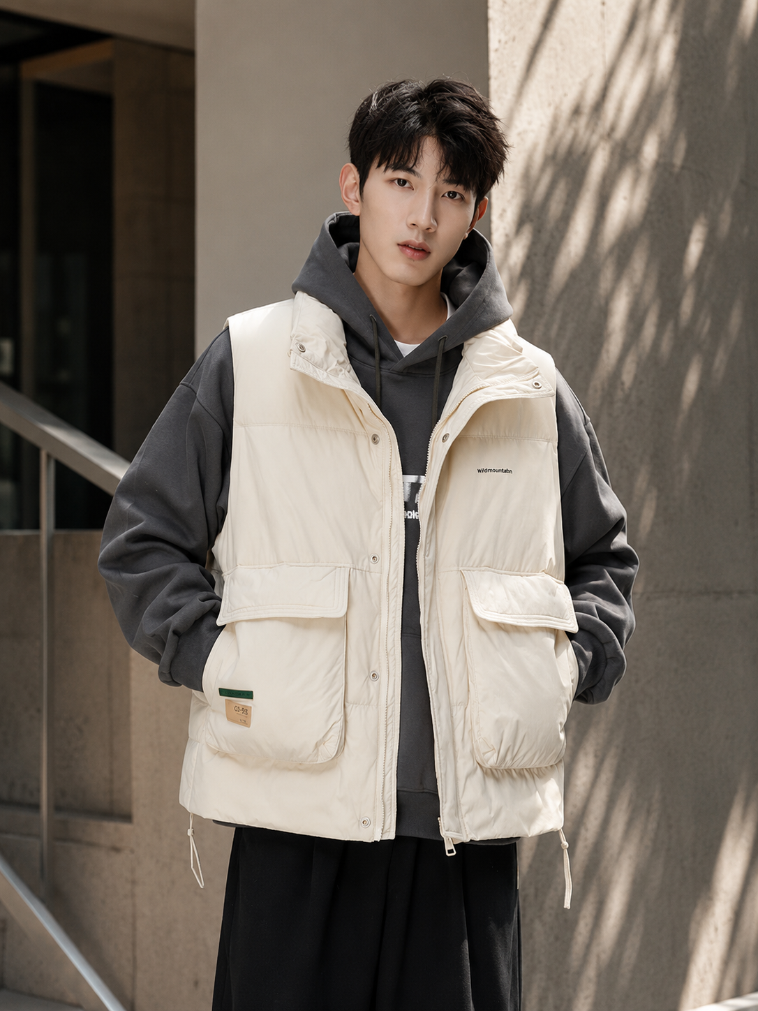 Insulated down vest cream urban lifestyle ad image