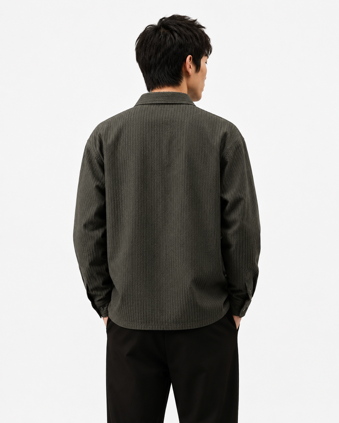 Male model wearing olive Japanese textured waffle shirt jacket, back view on white background