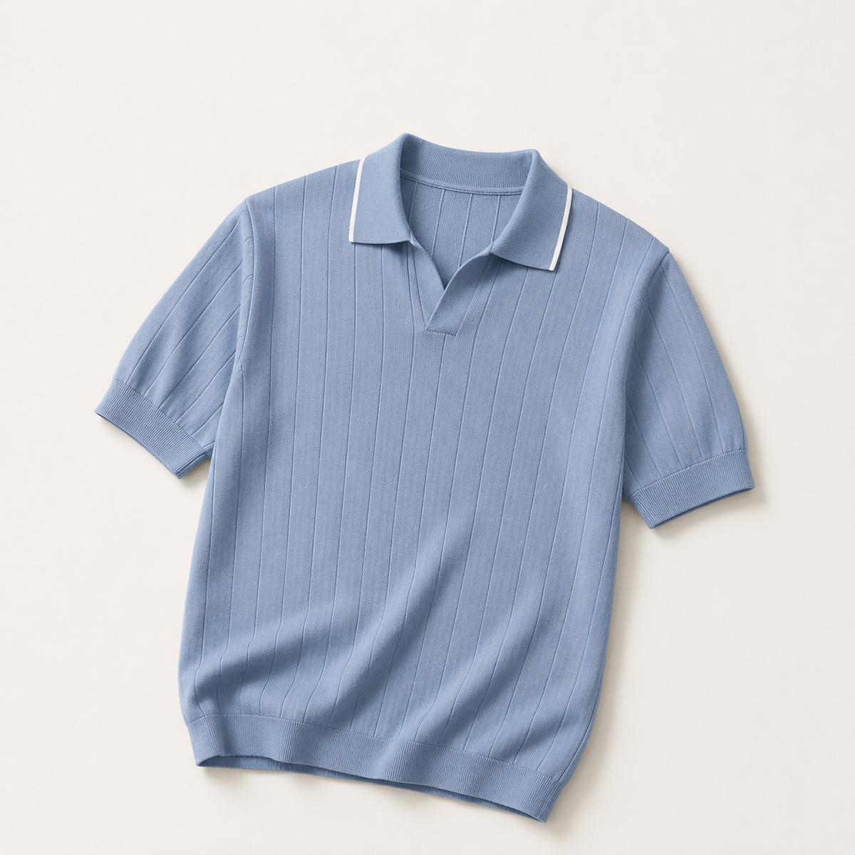 Light blue ribbed knit polo shirt with white collar piping, flat lay