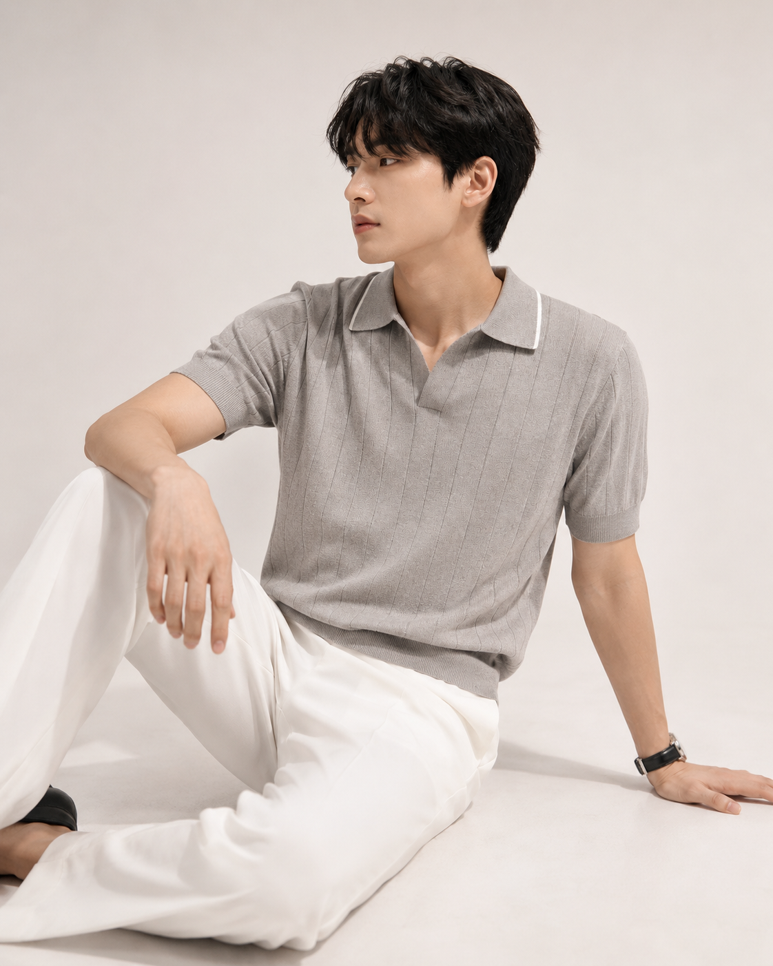Grey ribbed knit polo shirt styled on male model