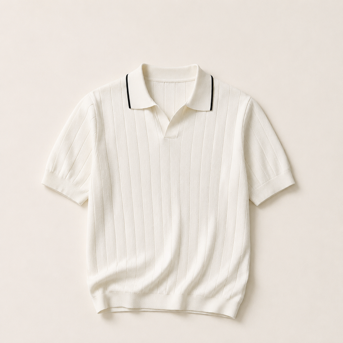 White ribbed knit polo shirt with black collar piping, flat lay