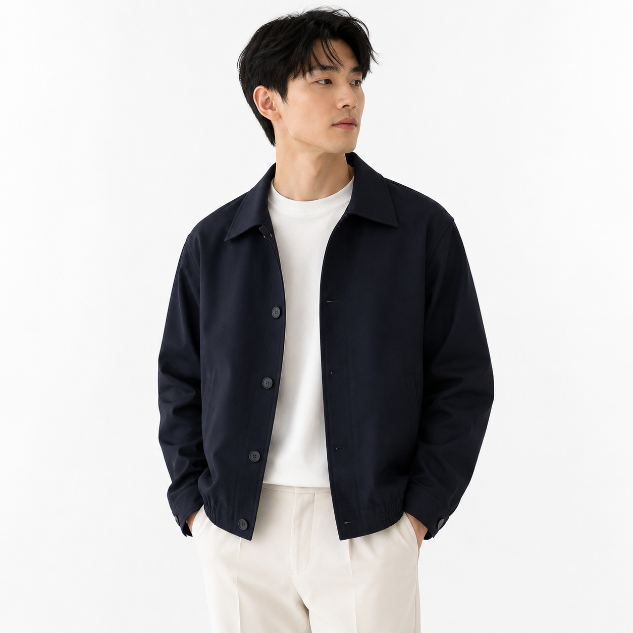 Black cropped jacket — front model view on white
