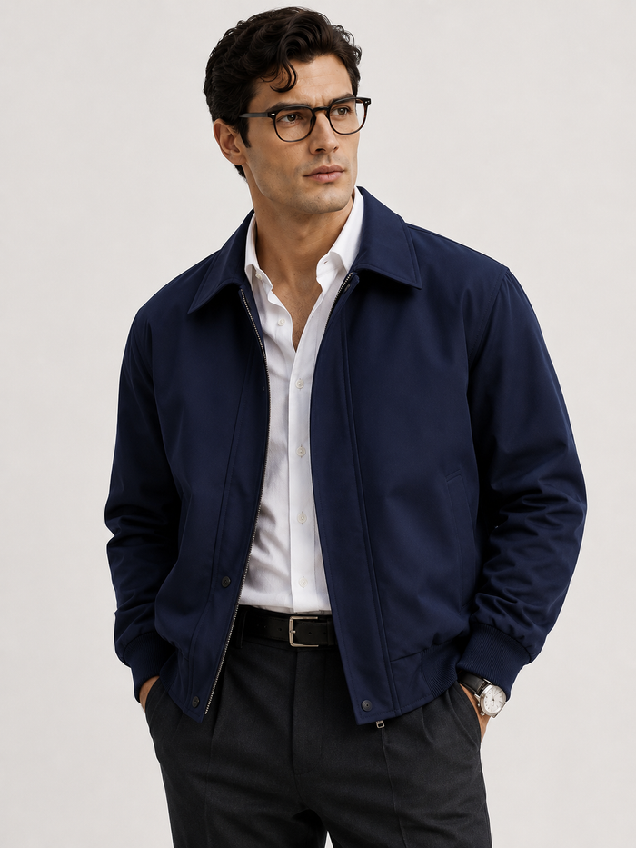 Fashion model wearing navy jacket in a studio