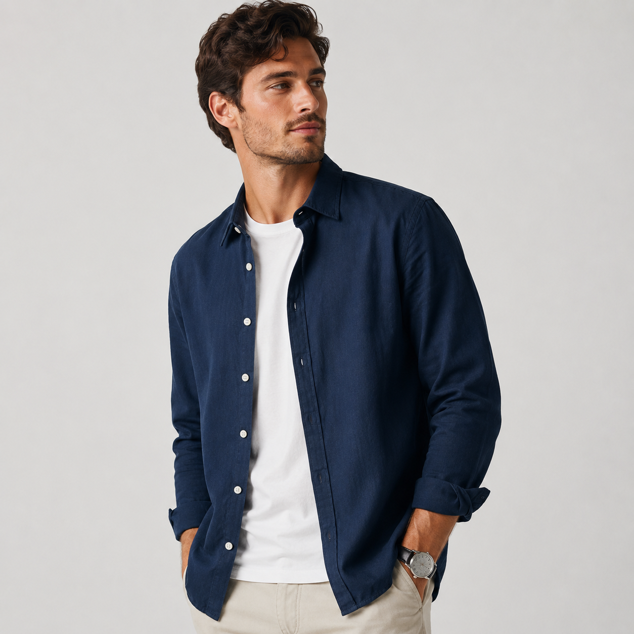 Model wearing the Osaka long-sleeve shirt in dark blue — front view