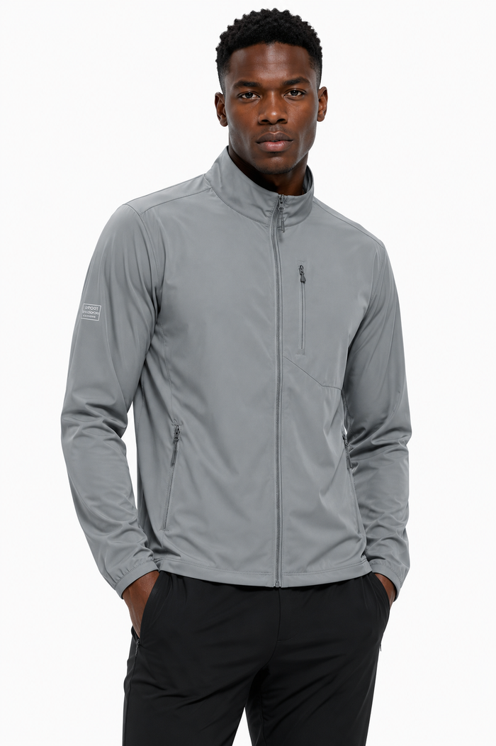 Black male sports model wearing the gray Vaughn Sun-Protection Sport Jacket