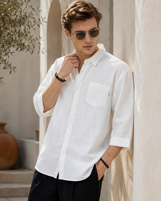 Model wearing the white cotton-linen shirt