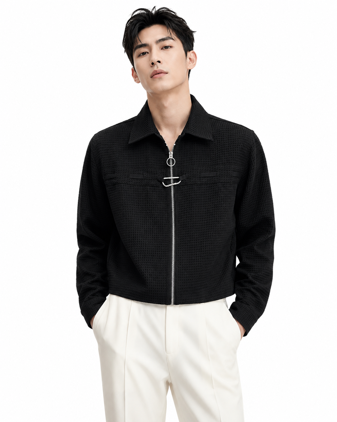Male model wearing black waffle-knit zip shirt jacket, front pose on white background