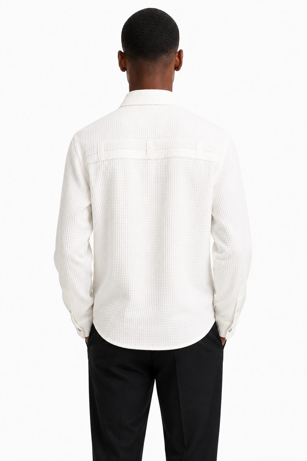 Black male model wearing white waffle-knit zip shirt jacket, back view on white background