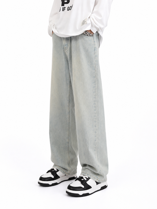 Model wearing light wash Washed Blue Straight-Leg Jeans, front view