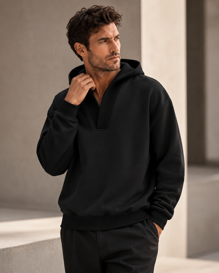 Male model wearing black Wool-Panel Hooded Sweatshirt
